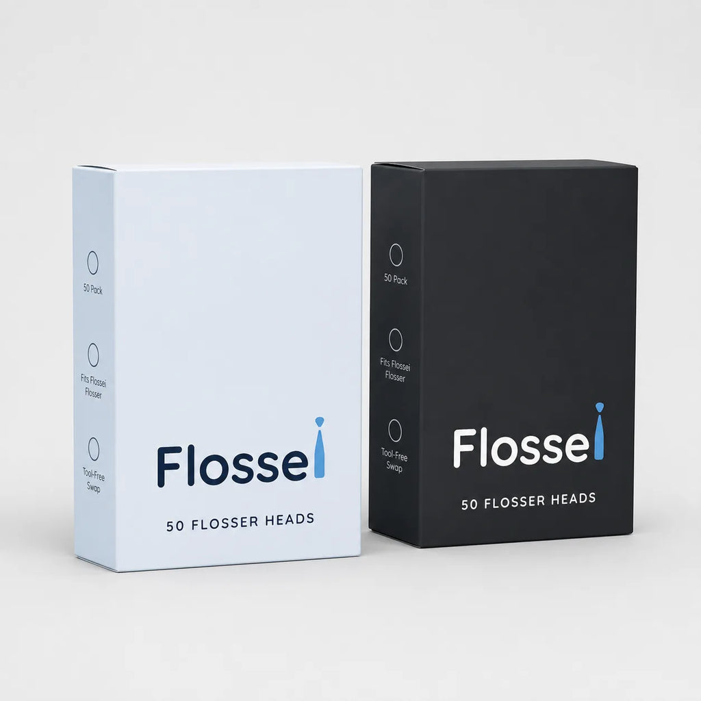 Two boxes of 50 Flossei reusable floss heads, Arctic White and Midnight Black