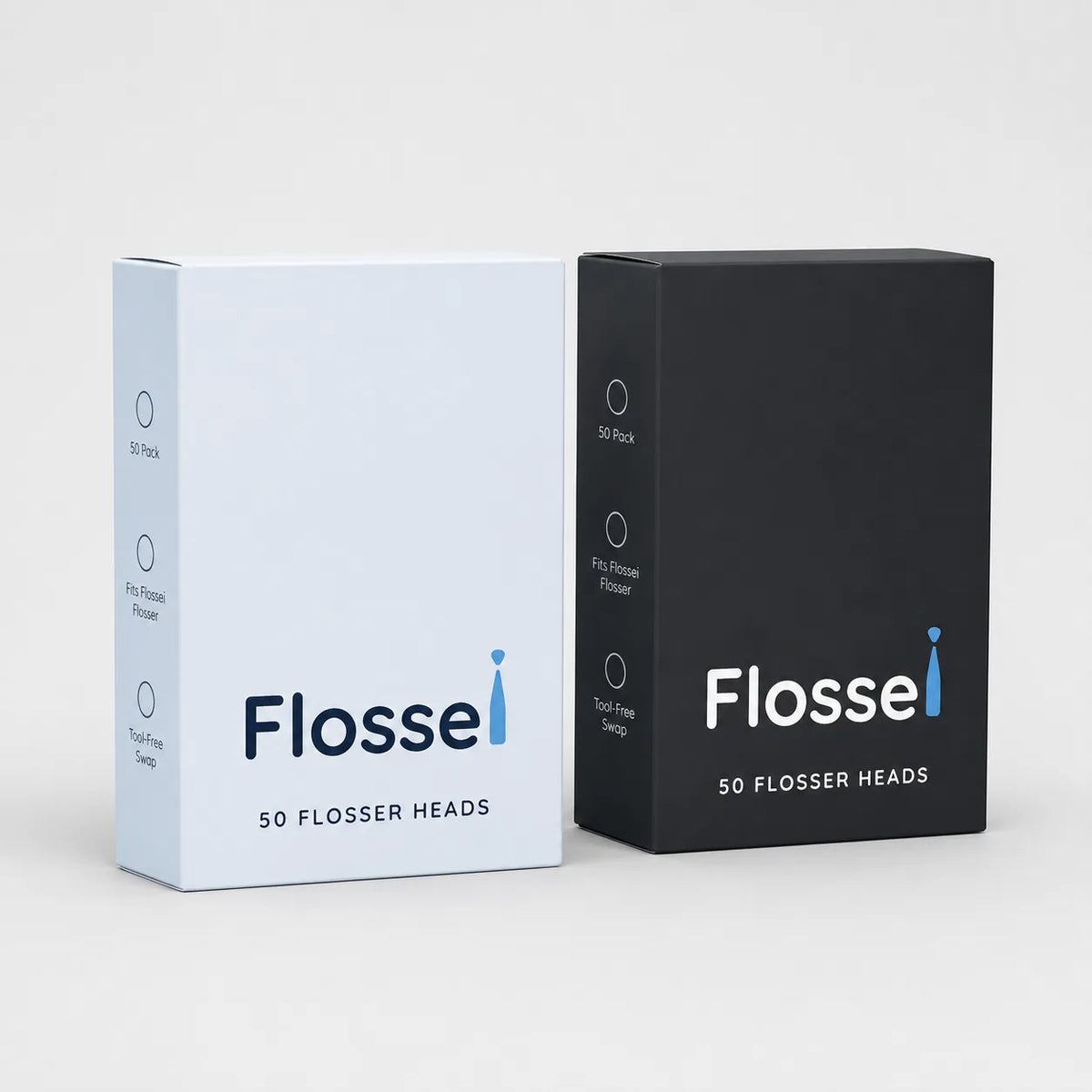 Two boxes of 50 Flossei reusable floss heads, Arctic White and Midnight Black