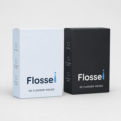 Two boxes of 50 Flossei reusable floss heads, Arctic White and Midnight Black