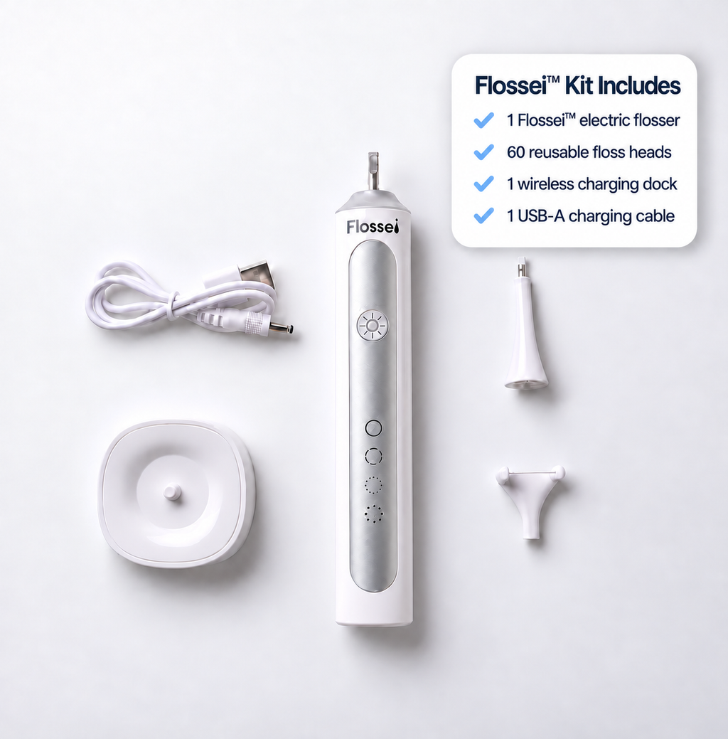 Flossei Electric Flosser kit in Arctic White, flat lay of flosser, charging dock, USB-A cable, floss head and tongue scraper attachment with a list of what is included