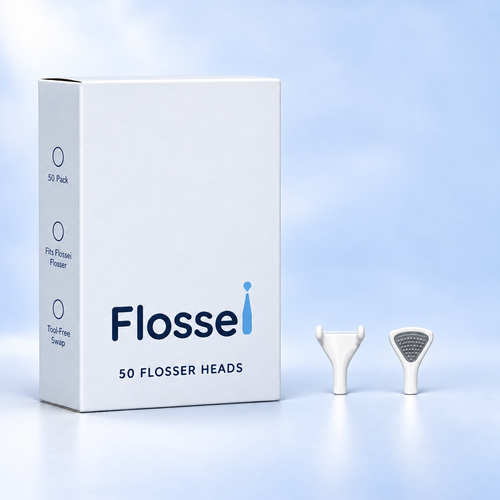 Box of 50 Flossei reusable floss heads in Arctic White with two floss heads shown beside it
