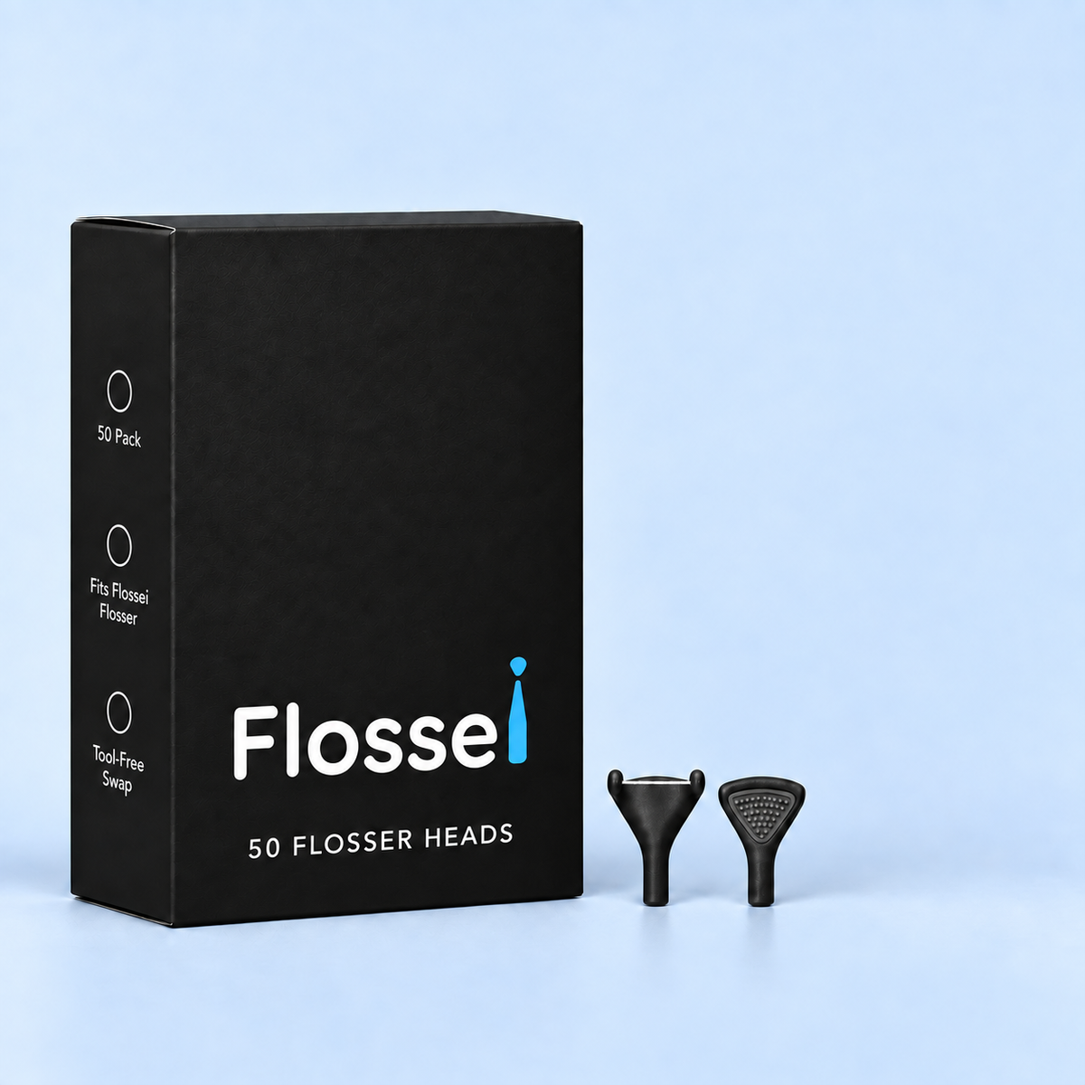 Box of 50 Flossei reusable floss heads in Midnight Black with two floss heads shown beside it