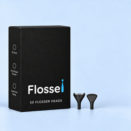 Box of 50 Flossei reusable floss heads in Midnight Black with two floss heads shown beside it